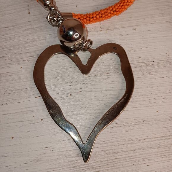 Suzie Blue Long Orange Beaded Necklace With Large Metal Heart (2.5"x3") - Picture 4 of 11